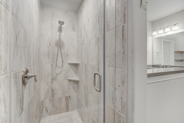 bathroom featuring an enclosed shower