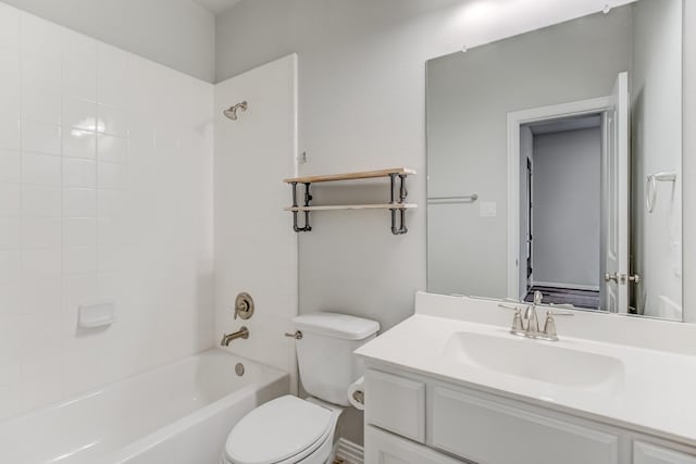 full bathroom with toilet, vanity, and tiled shower / bath combo