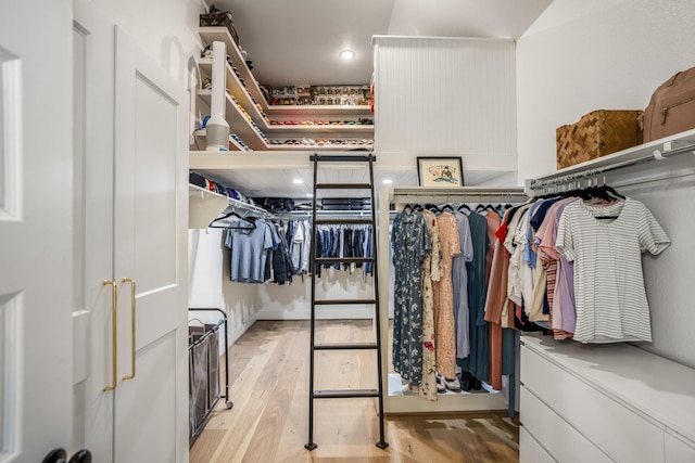 spacious closet featuring light hardwood / wood-style flooring