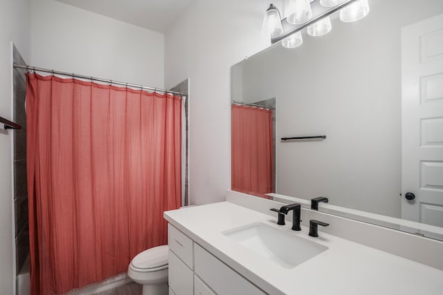 full bathroom with toilet, shower / tub combo, and vanity