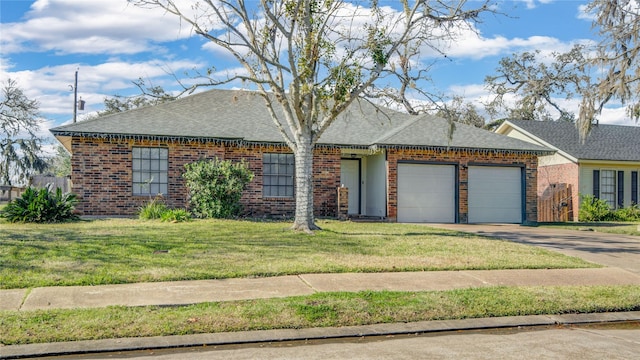 single story home with a front lawn and a garage