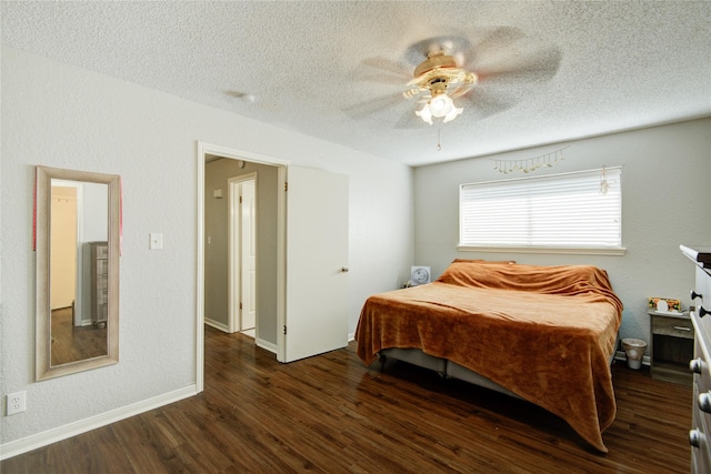 bedroom featuring ceiling fan and dark hardwood / wood-style floors