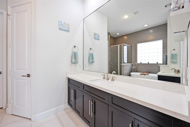 bathroom featuring a soaking tub, visible vents, a shower stall, vanity, and tile patterned flooring