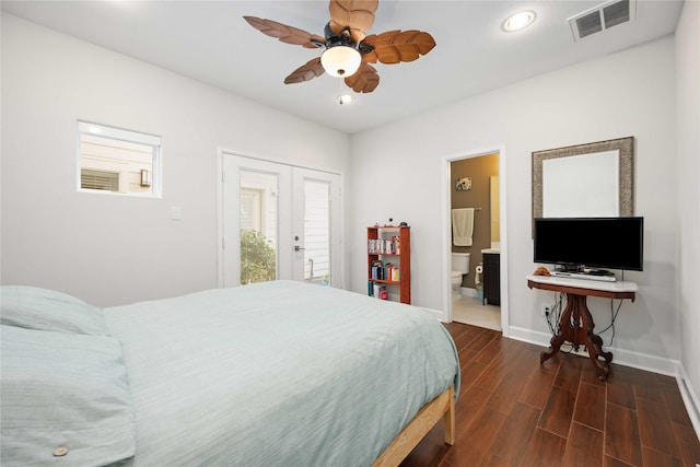 bedroom with baseboards, visible vents, dark wood-style floors, french doors, and recessed lighting