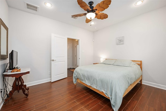 bedroom featuring recessed lighting, visible vents, dark wood finished floors, and baseboards