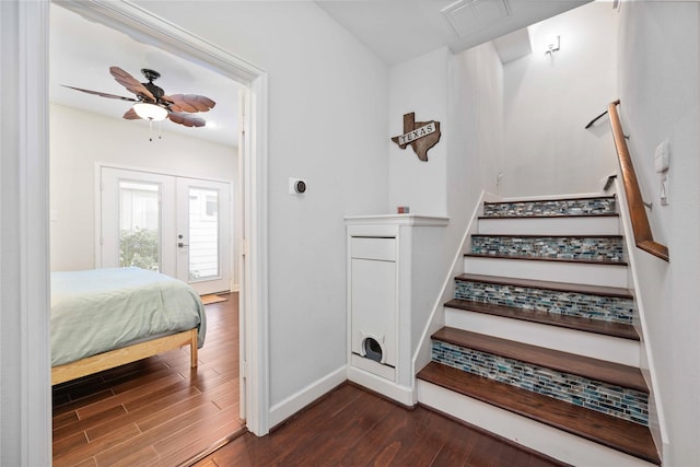 staircase with visible vents, baseboards, ceiling fan, wood finished floors, and french doors