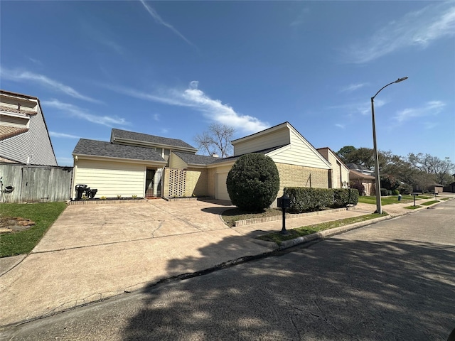 view of front of home with brick siding