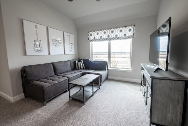 living room with vaulted ceiling and carpet