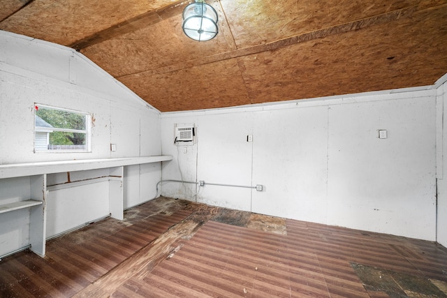 clothes washing area featuring an AC wall unit