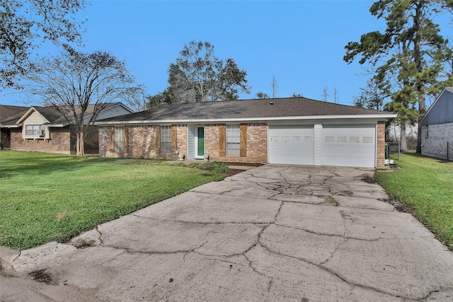 ranch-style home featuring a garage and a front lawn