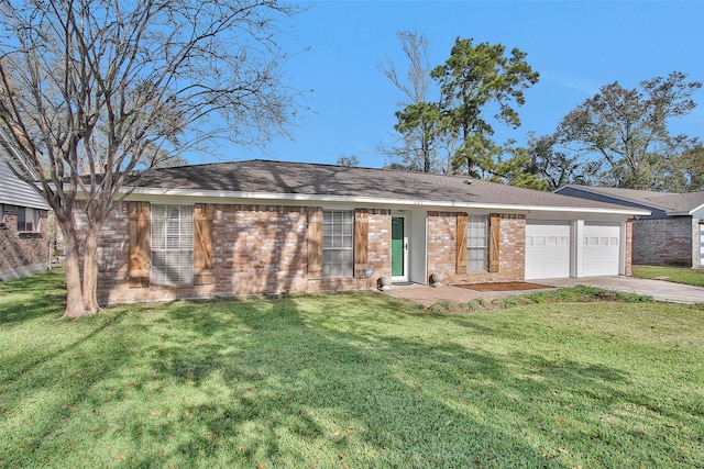 single story home with a front yard and a garage