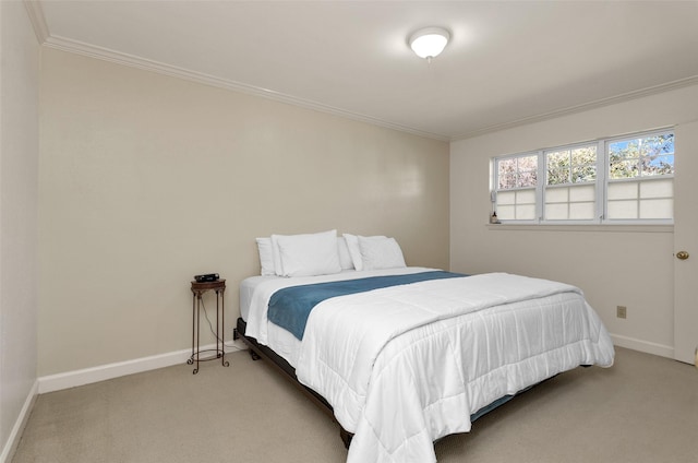 carpeted bedroom with ornamental molding