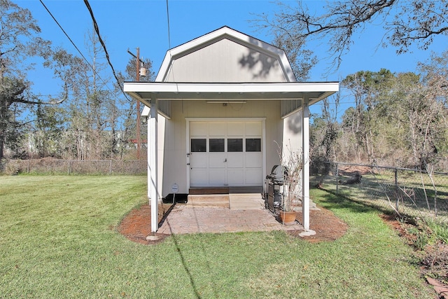 exterior space featuring a yard and a garage