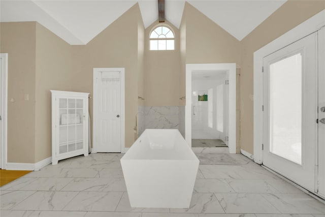 entryway with high vaulted ceiling