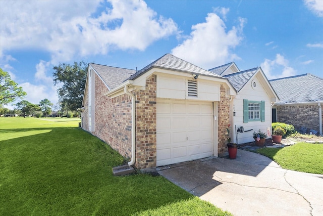 ranch-style house with a garage and a front yard