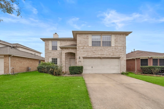 front of property featuring a front lawn and a garage