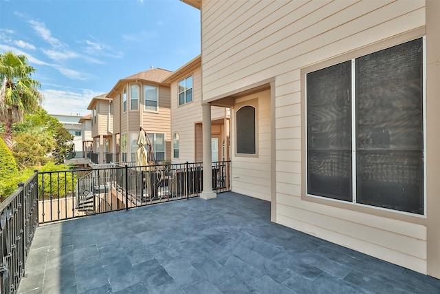 view of patio with a balcony