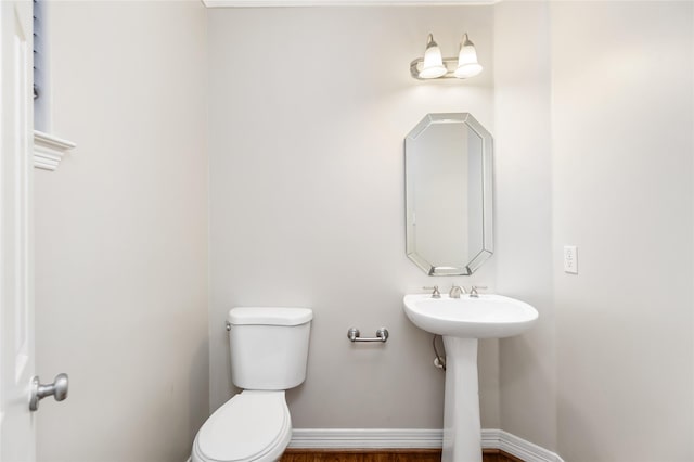 bathroom with sink and toilet