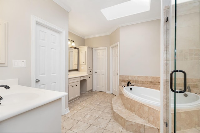 bathroom with a skylight, vanity, ornamental molding, tile patterned floors, and separate shower and tub