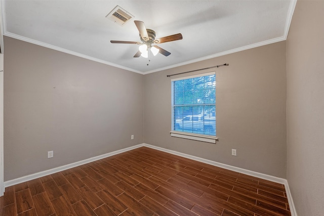 empty room with ceiling fan and crown molding