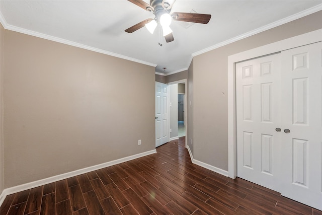 unfurnished bedroom featuring a closet, ceiling fan, and crown molding