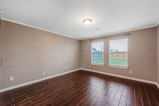 spare room with crown molding