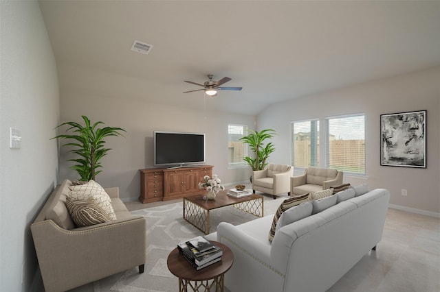 living room featuring ceiling fan and vaulted ceiling