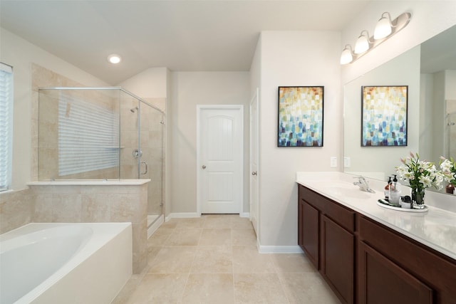 bathroom with shower with separate bathtub, tile patterned floors, and vanity