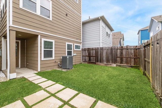 view of yard featuring central AC unit