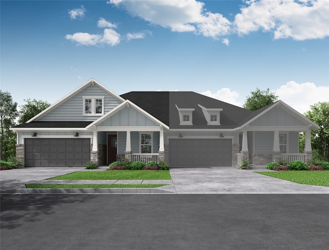 craftsman inspired home with stone siding, a porch, board and batten siding, and concrete driveway