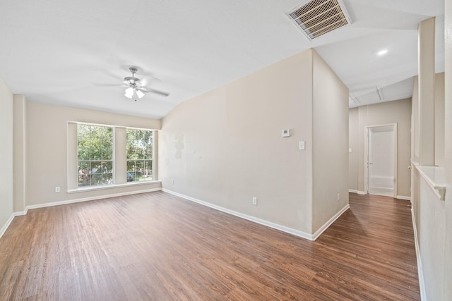 spare room with dark hardwood / wood-style flooring and ceiling fan