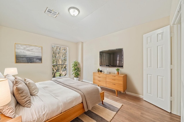 bedroom featuring light hardwood / wood-style flooring