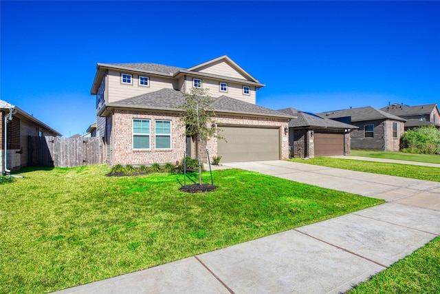 view of front facade with a front yard and a garage