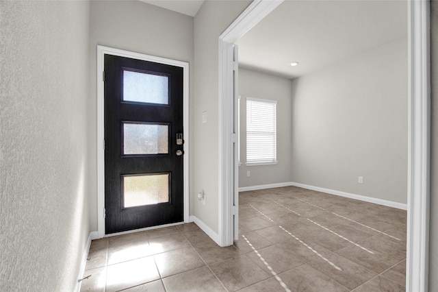 view of tiled foyer