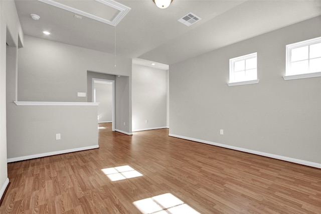 spare room with light wood-type flooring