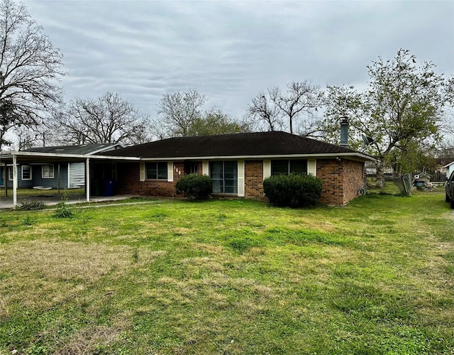 ranch-style home with a front yard