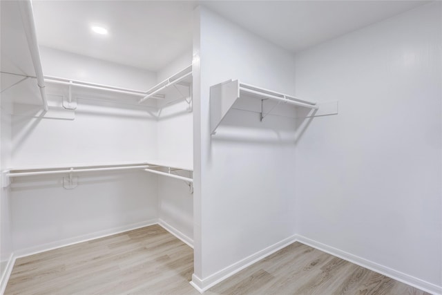 walk in closet featuring light wood-type flooring