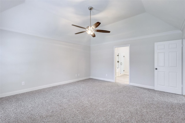 interior space with lofted ceiling, ceiling fan, and ornamental molding