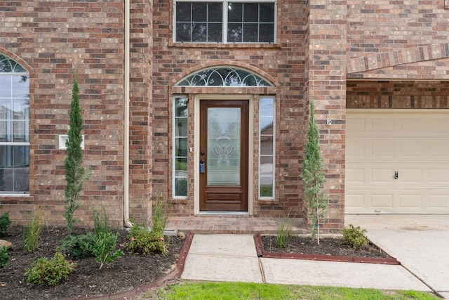 entrance to property with brick siding