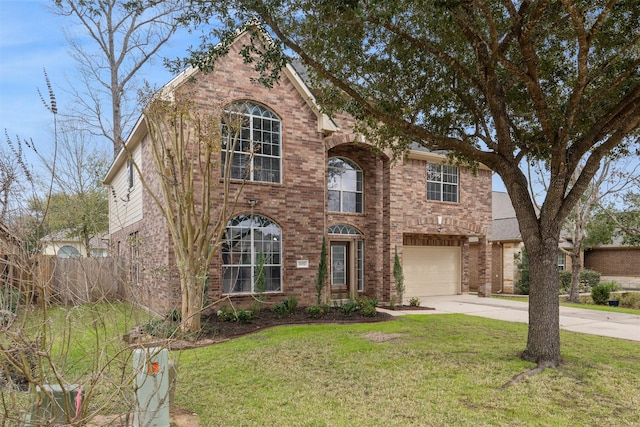 traditional-style house featuring a garage, driveway, brick siding, and a front lawn