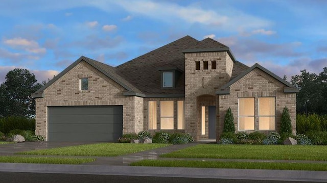 view of front facade featuring a lawn and a garage