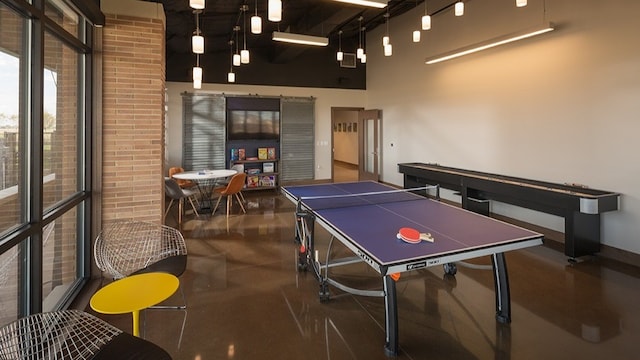 playroom with a high ceiling