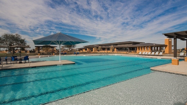 view of swimming pool featuring a patio