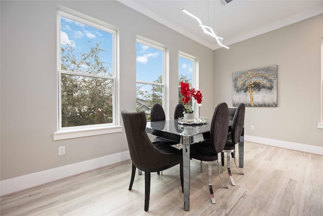 dining space featuring light hardwood / wood-style flooring