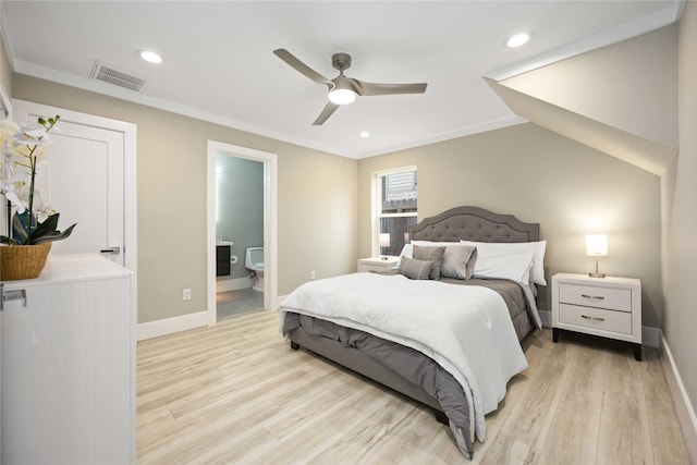 bedroom with light wood-type flooring, ceiling fan, ornamental molding, ensuite bathroom, and lofted ceiling