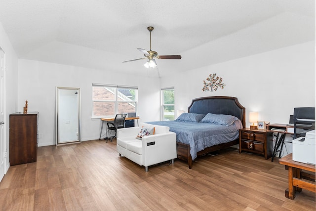 bedroom featuring ceiling fan and light hardwood / wood-style floors