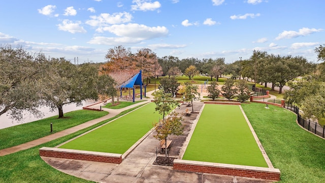 surrounding community with a gazebo and a lawn