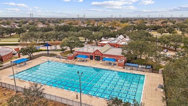 view of swimming pool with a patio area