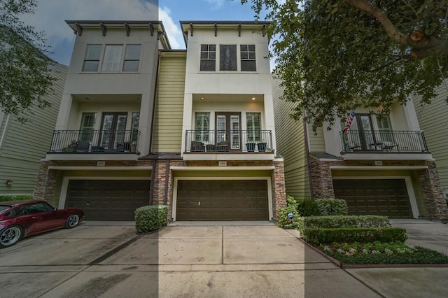 multi unit property with a balcony and a garage