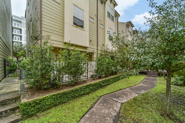 surrounding community featuring a lawn